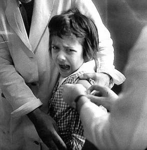 Distressed child receives a vaccination